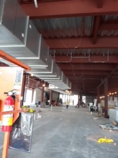 Overhead utilities coordinated before finish work.
