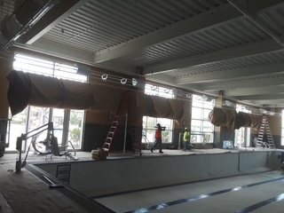 Overhead utilities coordinated before finish work.